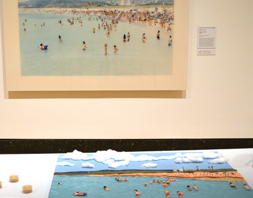 A photo of a beach scene and a tactile reproduction of the photo using sandpaper and cotton