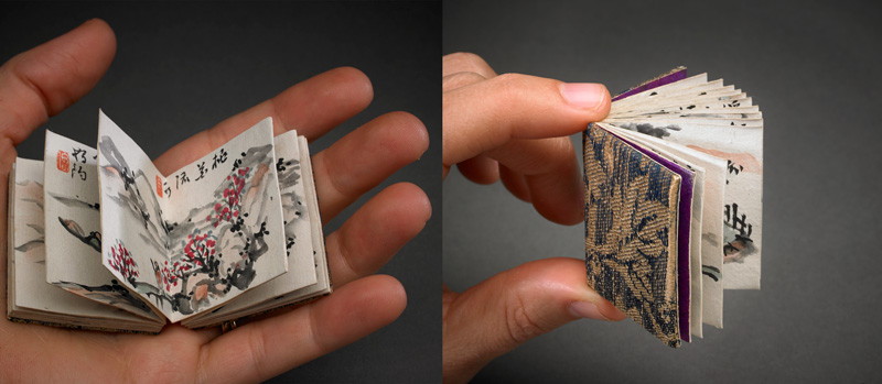 tiny books in a hand