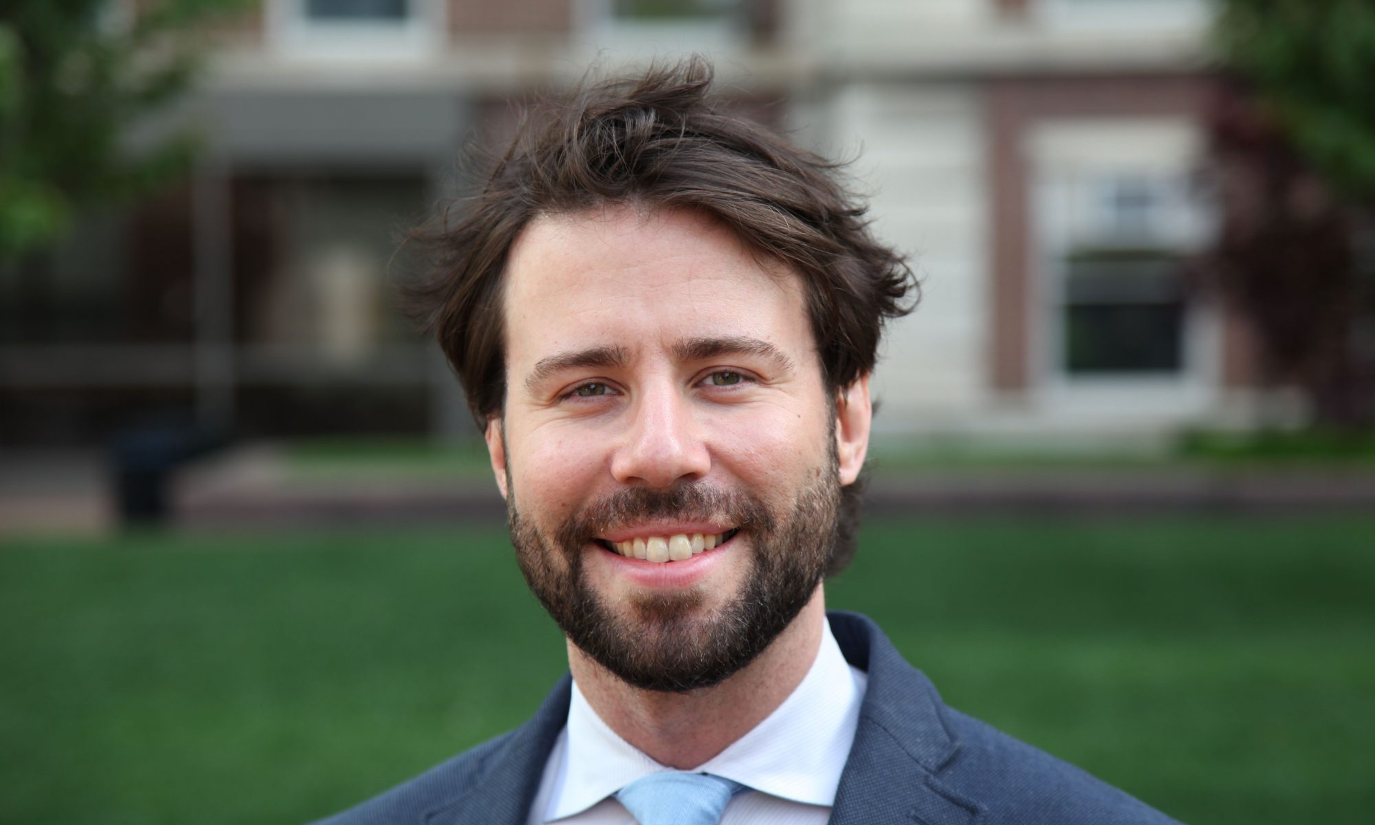 Professor Imre Bartos poses for a headshot.