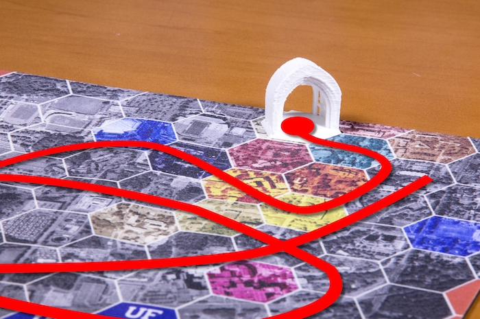 illustration of the board game with a game piece and line meandering around it