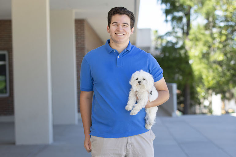 Christian Javier and Ollie the dog