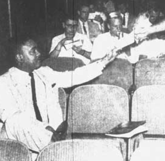 George Starke, Jr., the first African American student at UF, attends a class