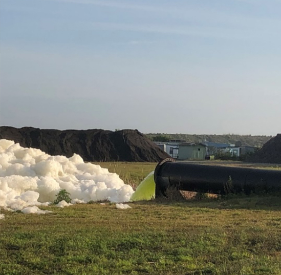 Toxic refuse is dumped into a body of water at Piney Point