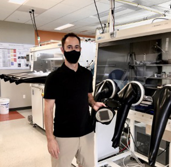 Mattrix CEO and founder, Max Lemaitre, displays new, full-color OLED display prototype in one of the Mattrix Technologies labs located in The Hub. 