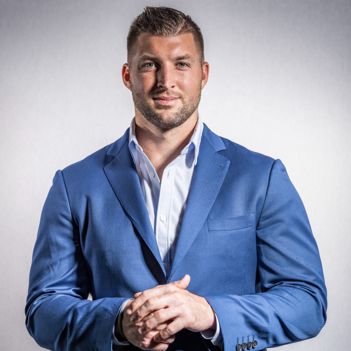 A man poses while staring at the camera 