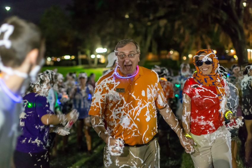 UF President Kent Fuchs and wife Linda at an evening shaving cream fight on UF campus