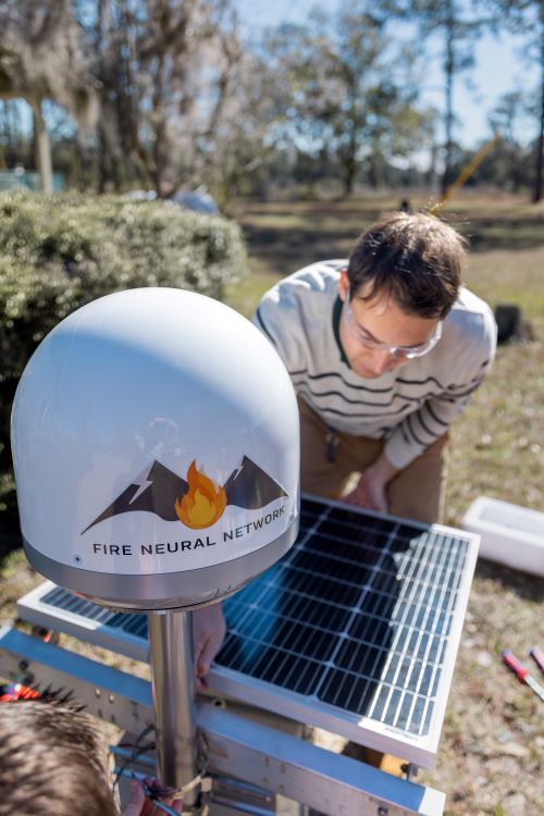 man with lightning detector from Fire Neural Network