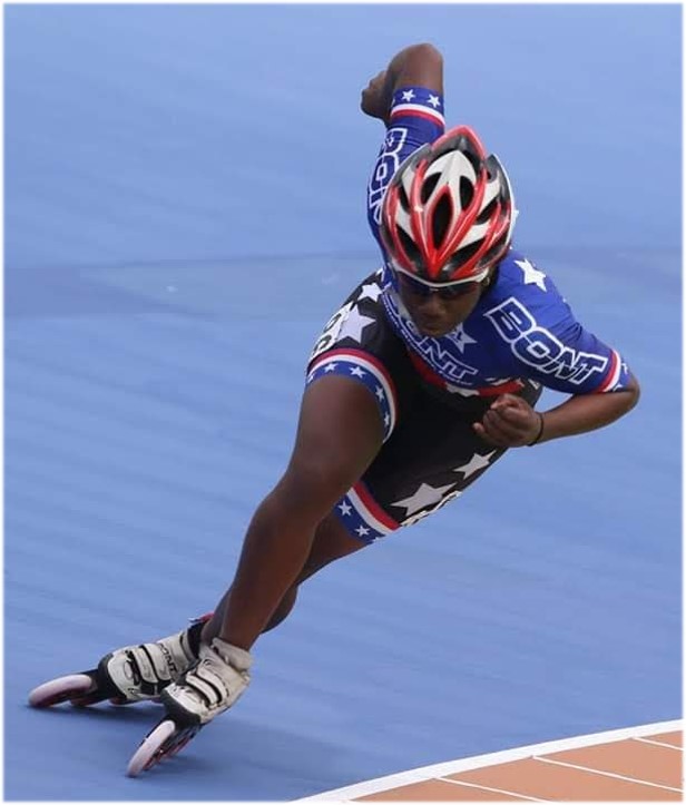 A woman inline skating.