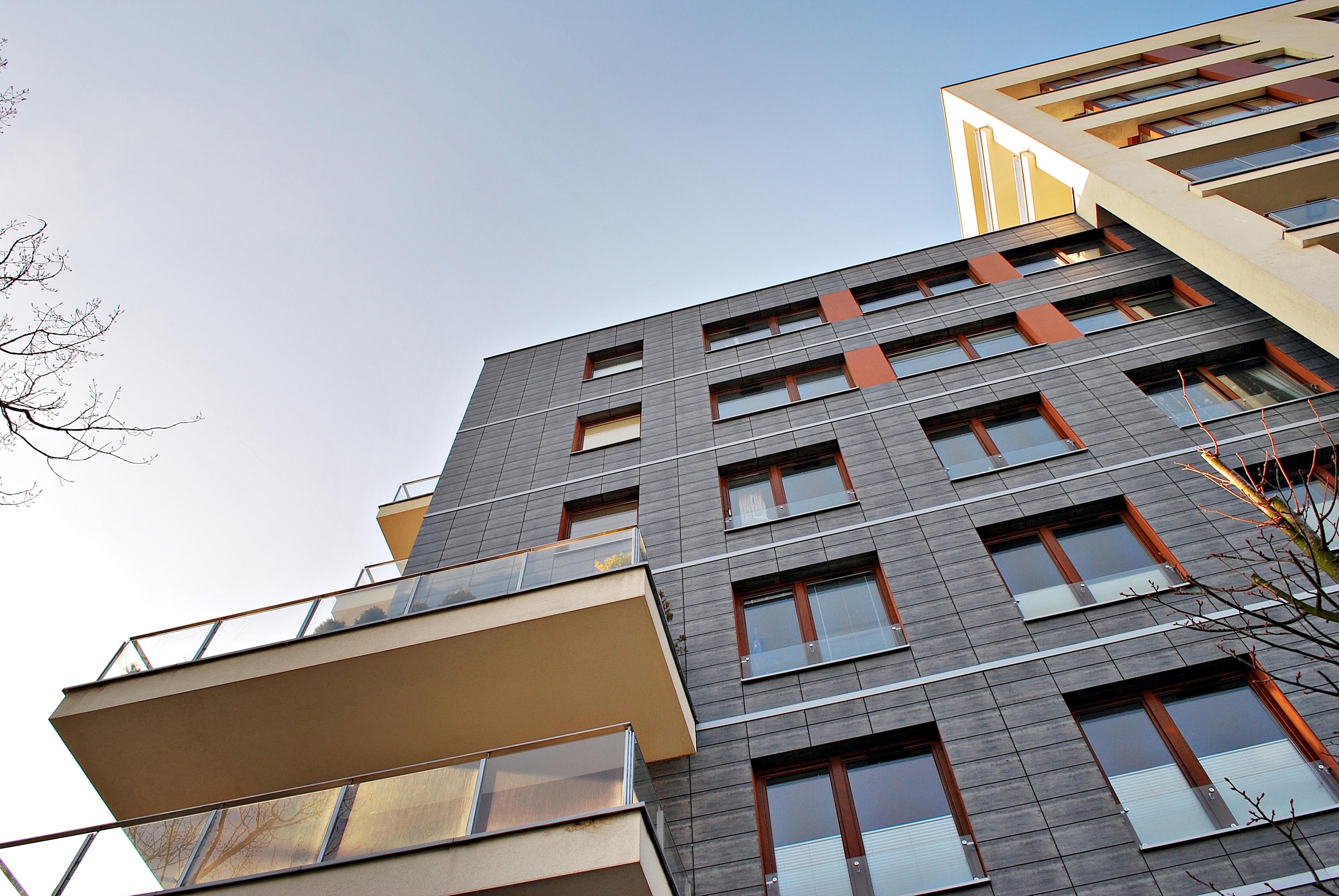 A stock image of a modern apartment building.