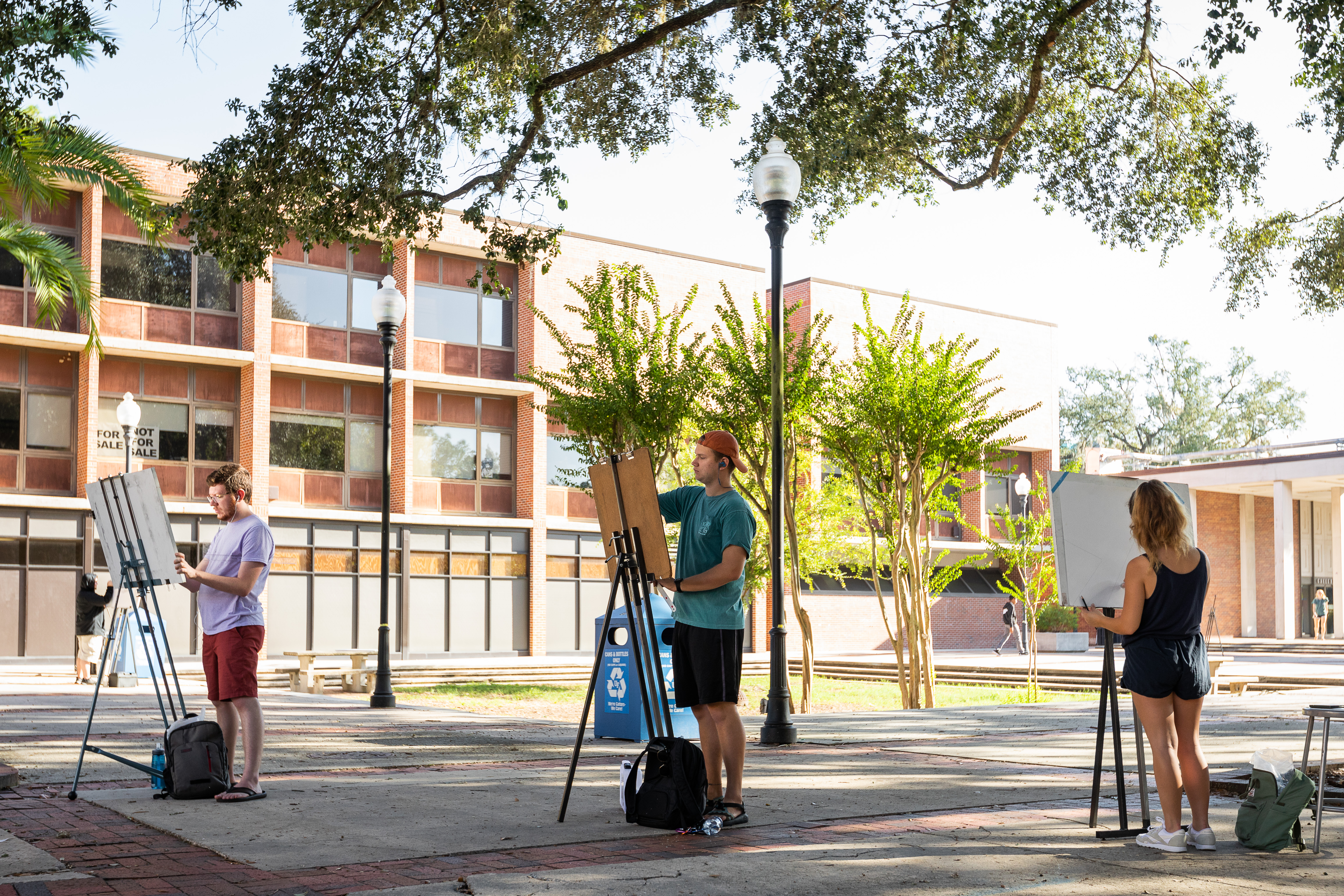 University of Florida College of the Arts students enjoying their perceptual drawing course outdoors on campus.