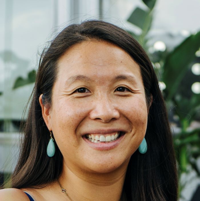 A picture of journalist Jess Jiang cropped above the shoulders