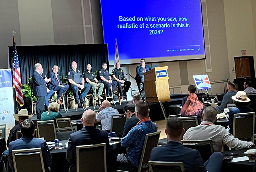 a panel of police at a meeting