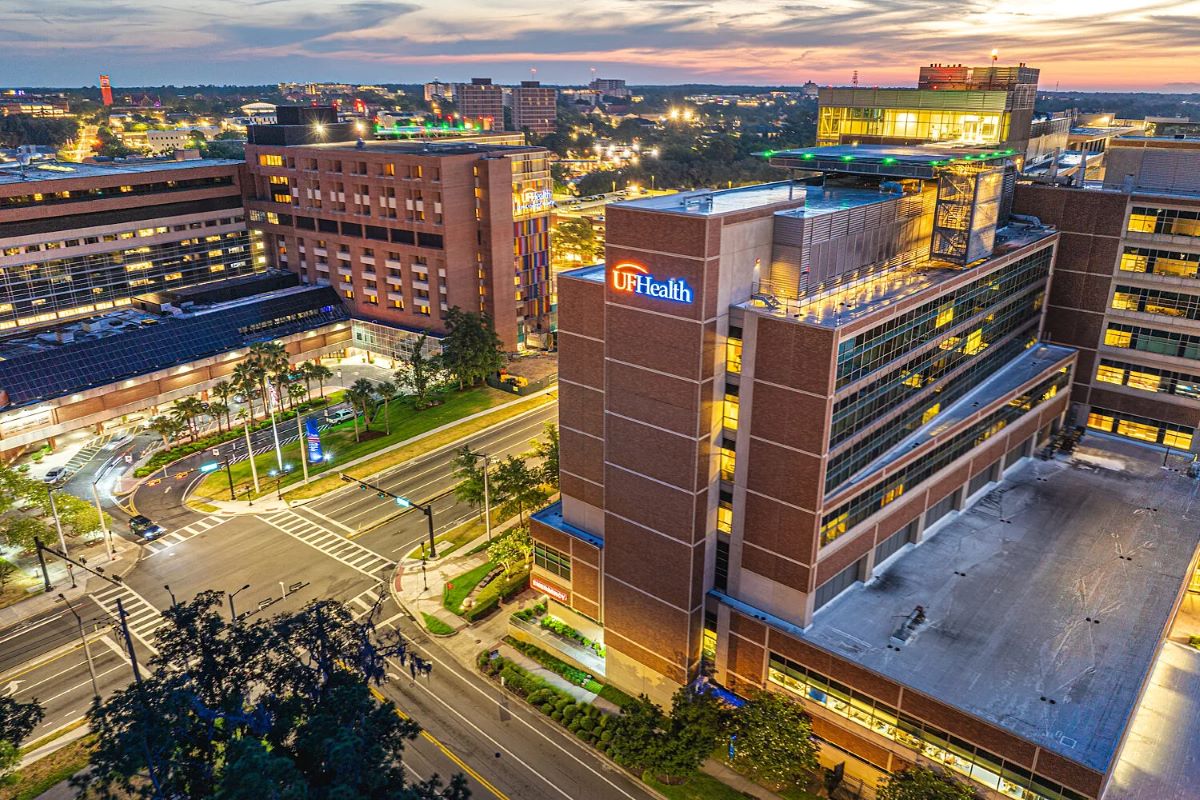 The UF Health Shands Hospital from above at dusk