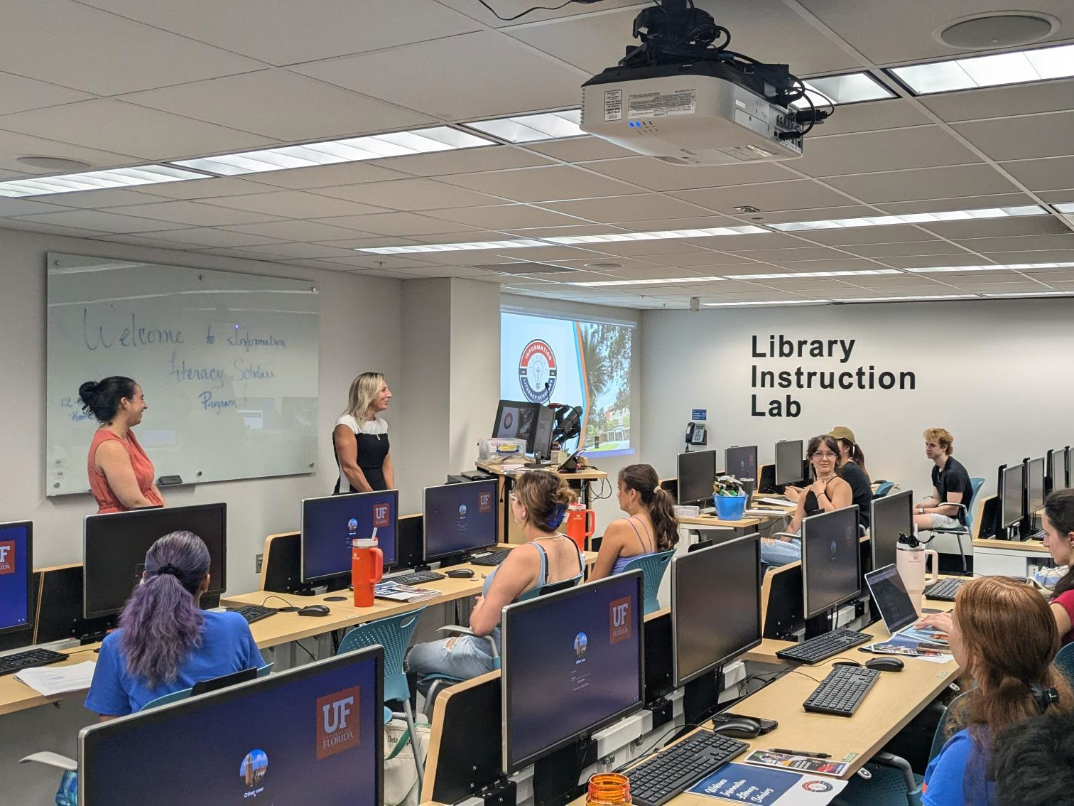 A classroom of college students at computers.