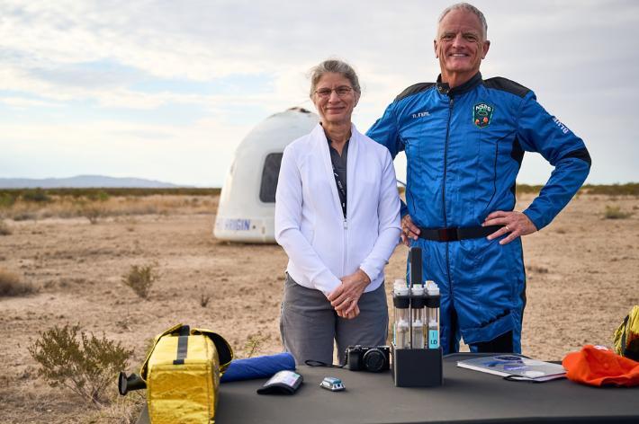 Rob Ferl and Anna-Lisa Paul pose with their experiment after Ferl went to space.