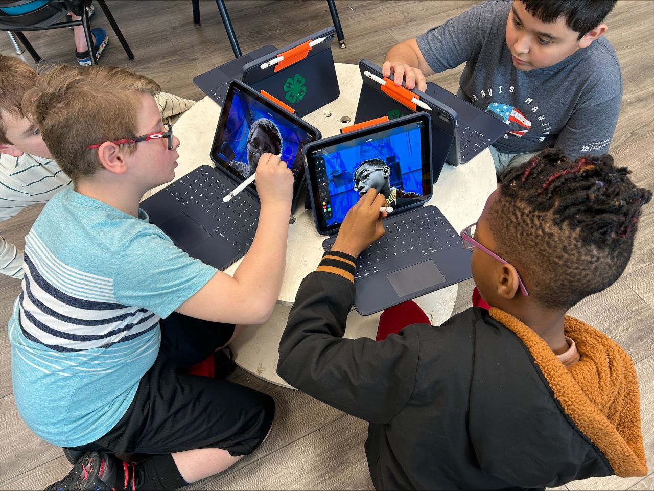 Children work with iPads during a Florida 4-H lesson