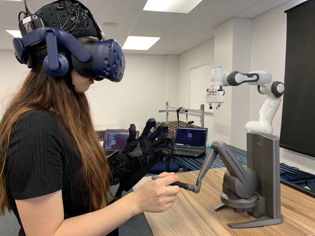 A UF student performs space operations testing