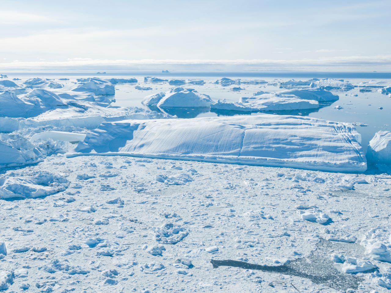 A glacier melting into the sea