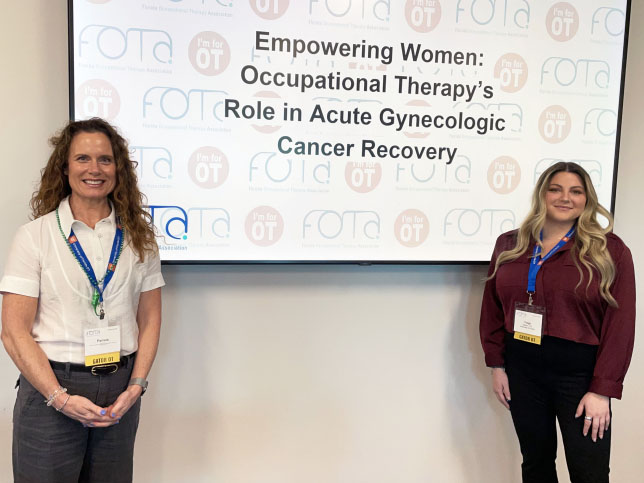 Paige Gibson (right) and Pamela Hess presented on occupational therapy’s role in gynecological cancer recovery at the Florida Occupational Therapy Association annual meeting in January.