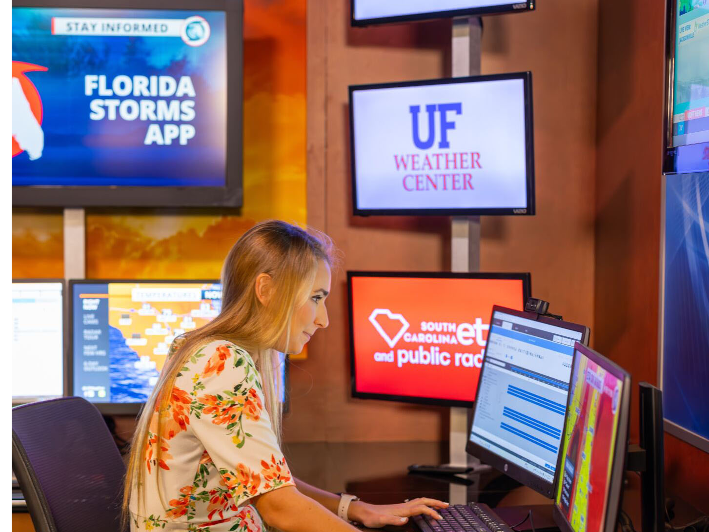 WUFT/FPREN meteorologist Megan Borowski studies the weather