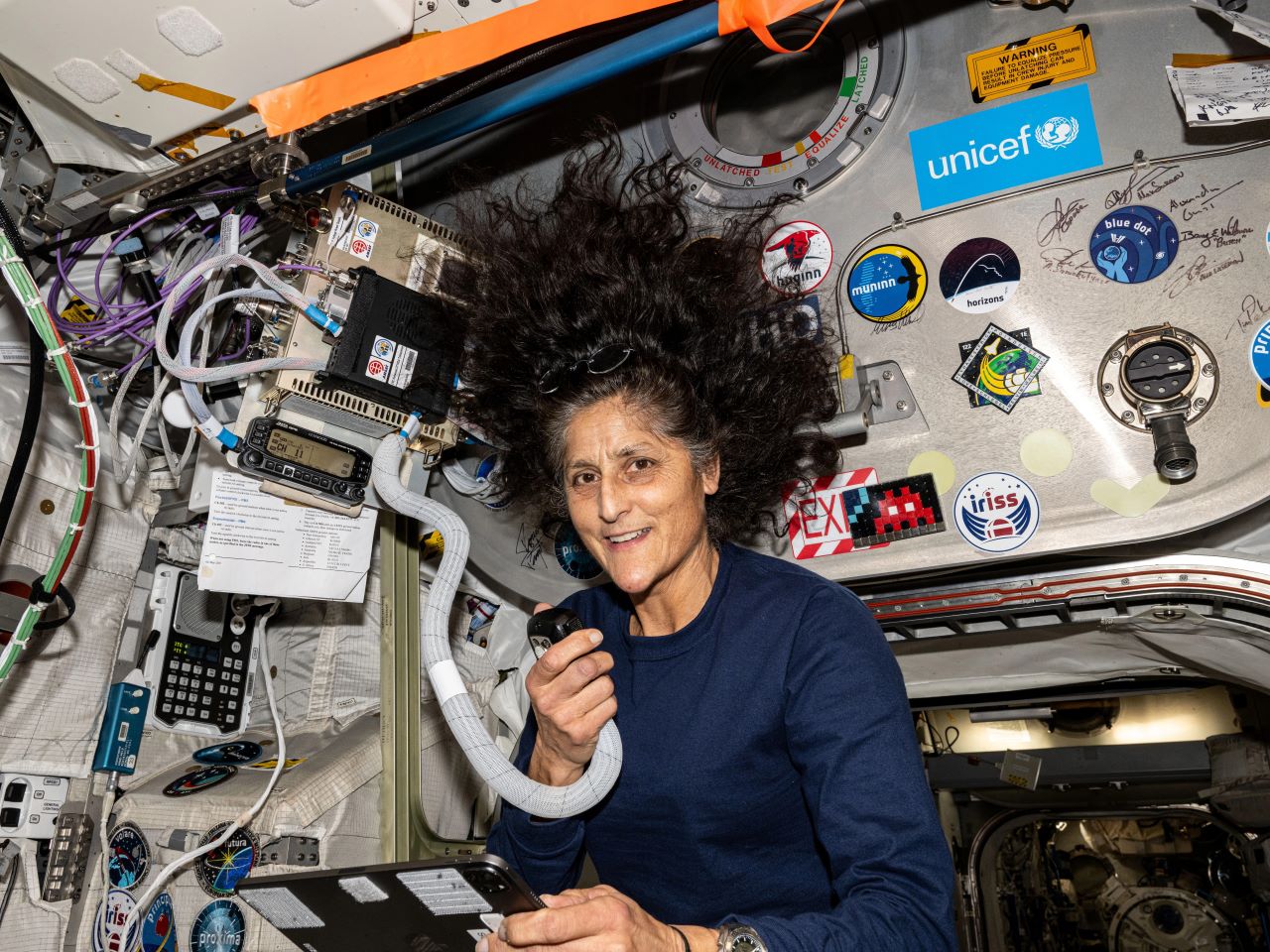 NASA astronaut Suni Williams speaks into the microphone during a HAM Radio session with students from Banda Aceh, Indonesia.