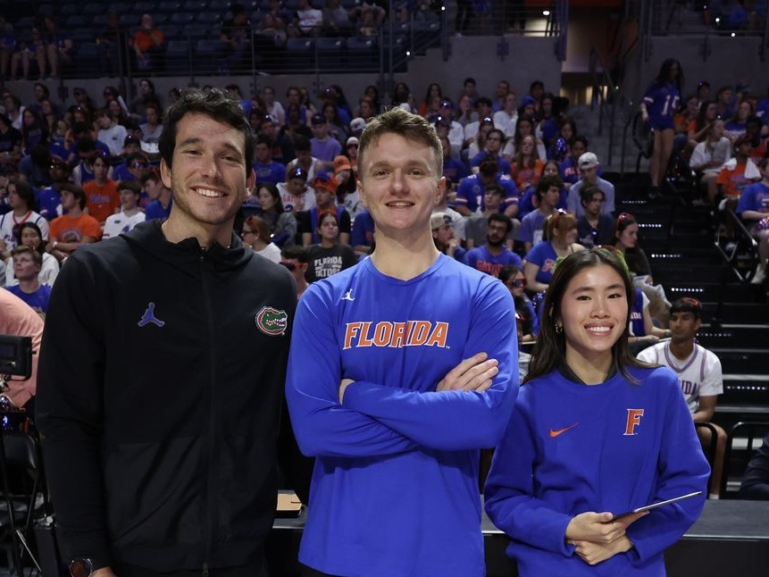UF athletics interns Dylan East (left), Mac Carnell (middle) and Hanna Lewis (right) (Photo credit: Maddie Washburn, director of photography, UAA)