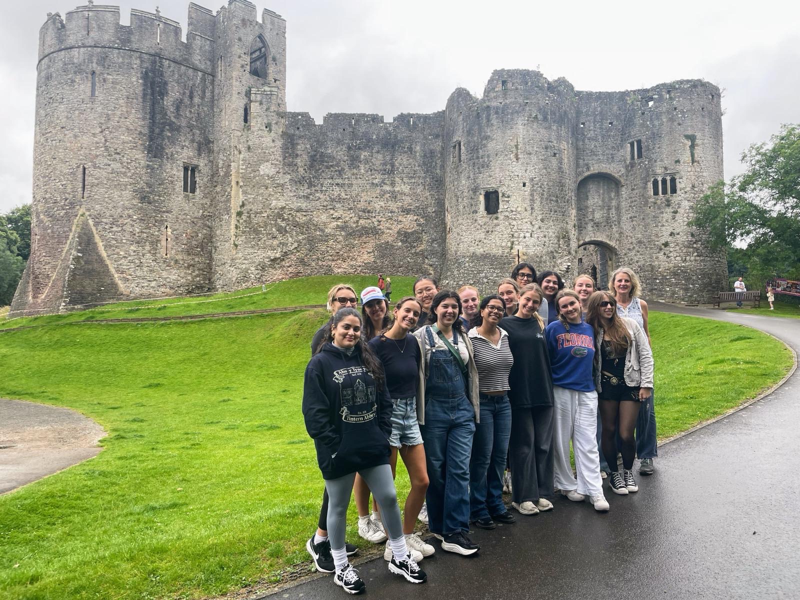 UF students pose in front of castle in Wales