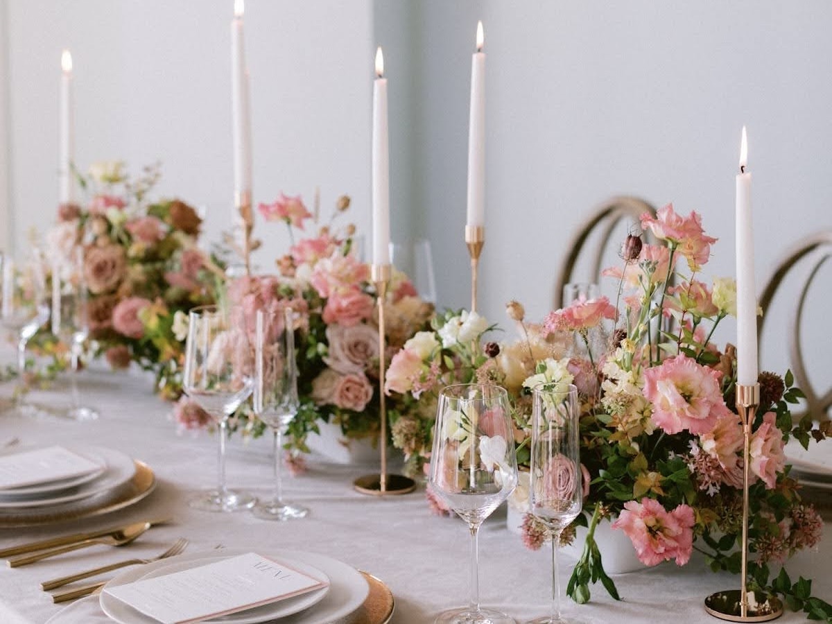 A photo of wedding florals and table settings. Ash Simmons Photography @ashsimmons.