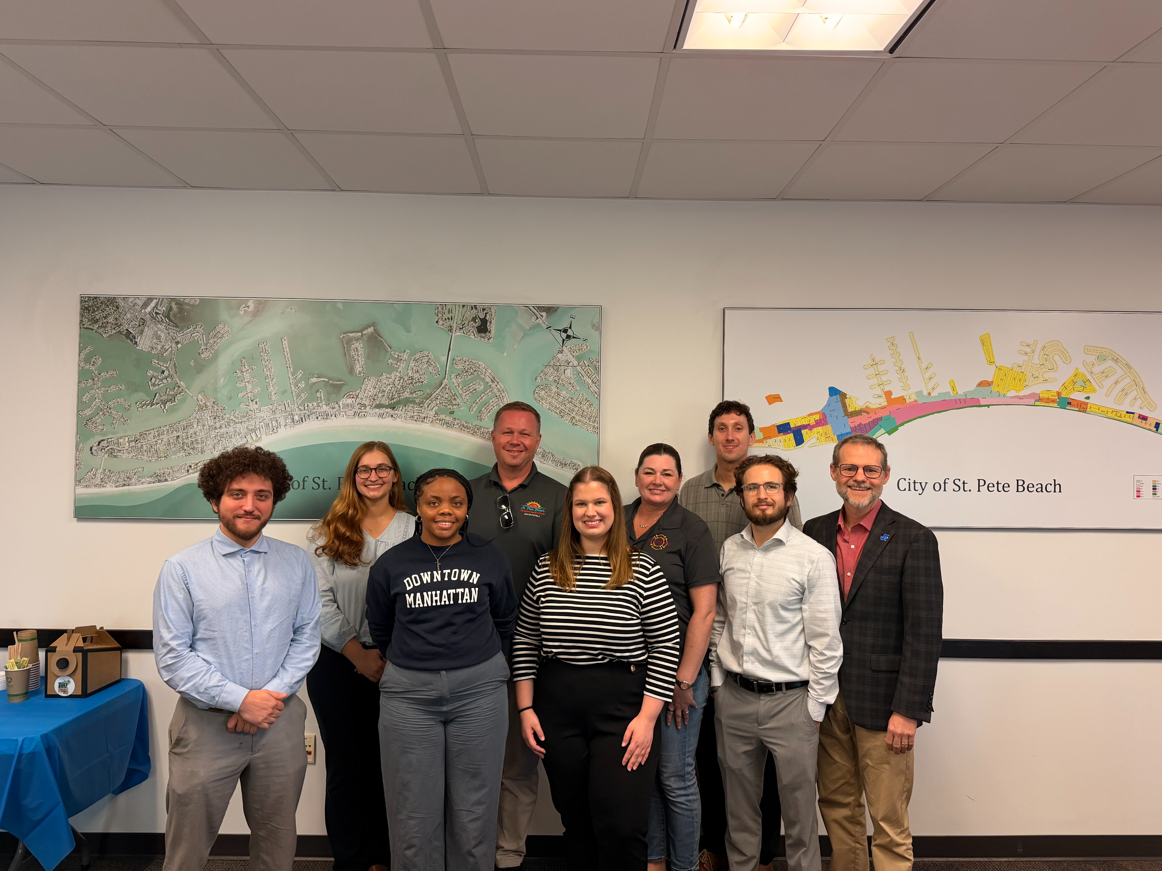 From left to right, people pictured are:  Zac Cosner, Libby Putnam, Leviticus Bennett, St. Pete Beach Mayor Adrian Petrila, Olivia Guntner, St. Pete Beach City Manager Frances Robustelli, Jack Gustke, Rocky Tinkler, Thomas Hawkins