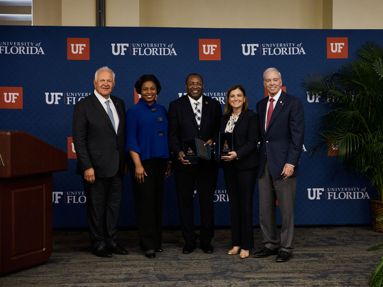 Group of recipients accepting a Win Phillips Town Gown Award on behalf of UF Nursing